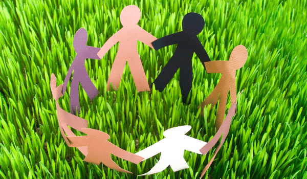 paper dolls on grass